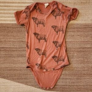 Kate Quinn bison bodysuit